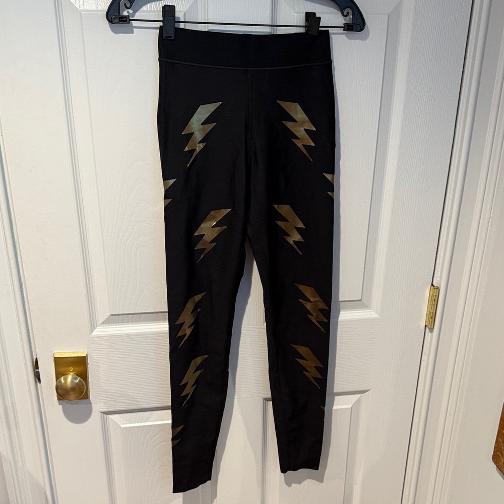 Ultracor Black Leggings with Gold Lightning Bolts